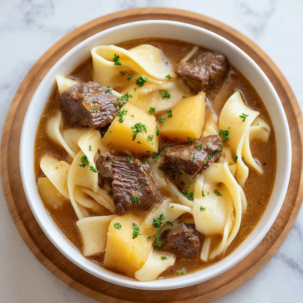 Savory Beef Tips with Buttery Noodles Recipe - Recipe Image